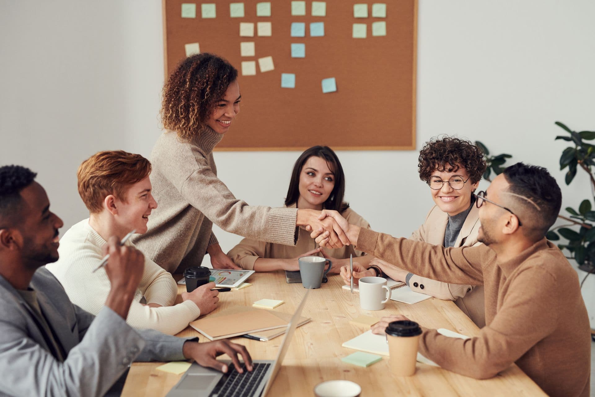 People discussing a project around a table